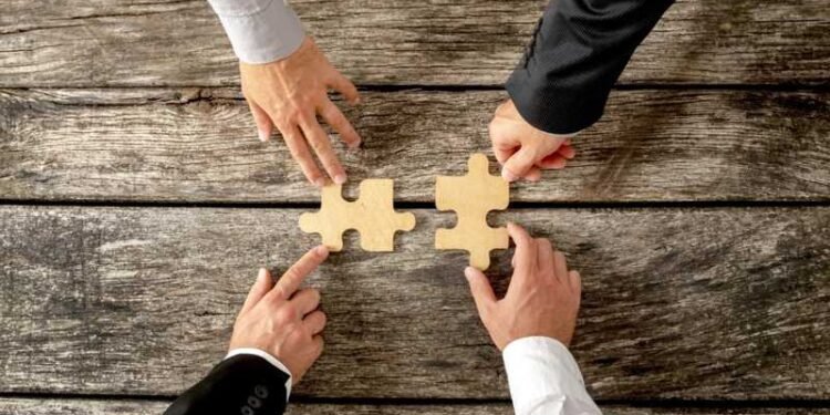 20 % انخفاضا في صفقات الاندماج والاستحواذ عالميًا العام الماضي